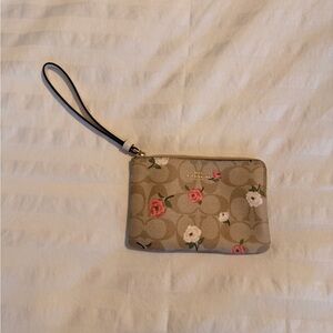 Coach Beige Wristlet with Pink and White Floral Accents